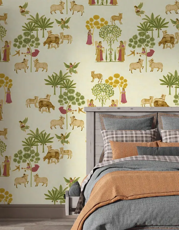 Bedroom with a hand-painted Indian folk-art wallpaper of cows, trees and figures