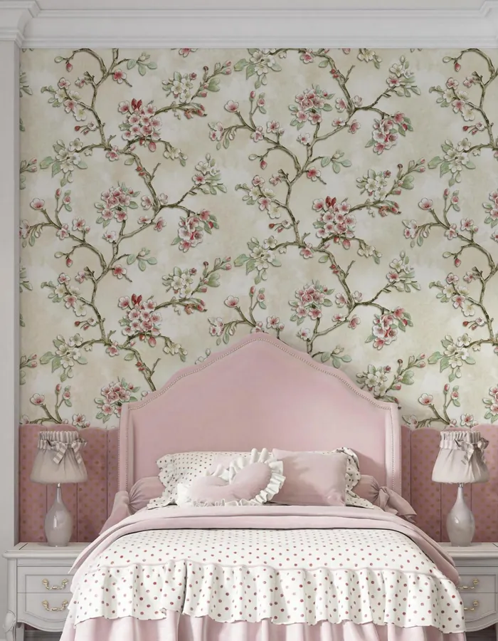 Girl's bedroom with a cherry-blossom branch wallpaper and a pink headboard