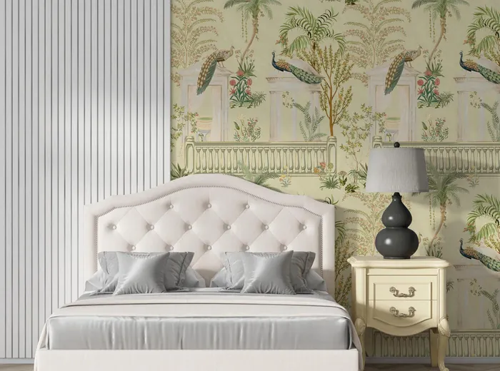 Bedroom with a palace-and-peacock mural wallpaper behind a tufted headboard
