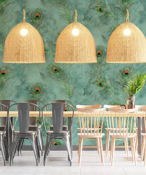 Dining room with a teal peacock-feather wallpaper under three rattan pendant lights