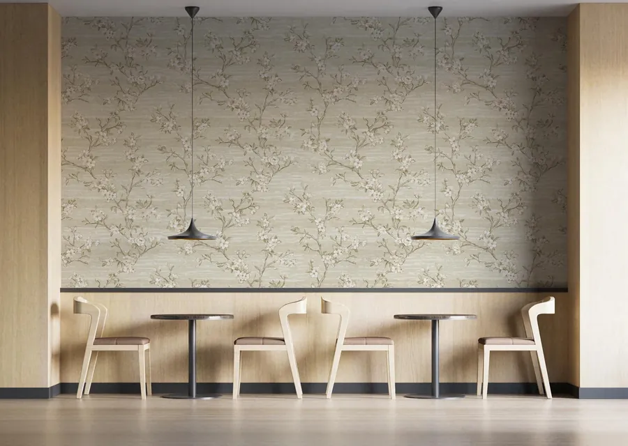 Café-style counter with high stools against a textured blossom wallpaper