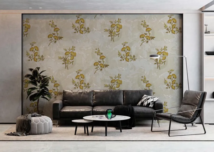 Lounge with a framed gold floral wallpaper panel behind black leather sofas